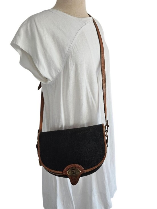Dooney & Bourke Handbags - Dooney & Bourke Vintage Leather Crossbody Saddle Bag in Black and Brown